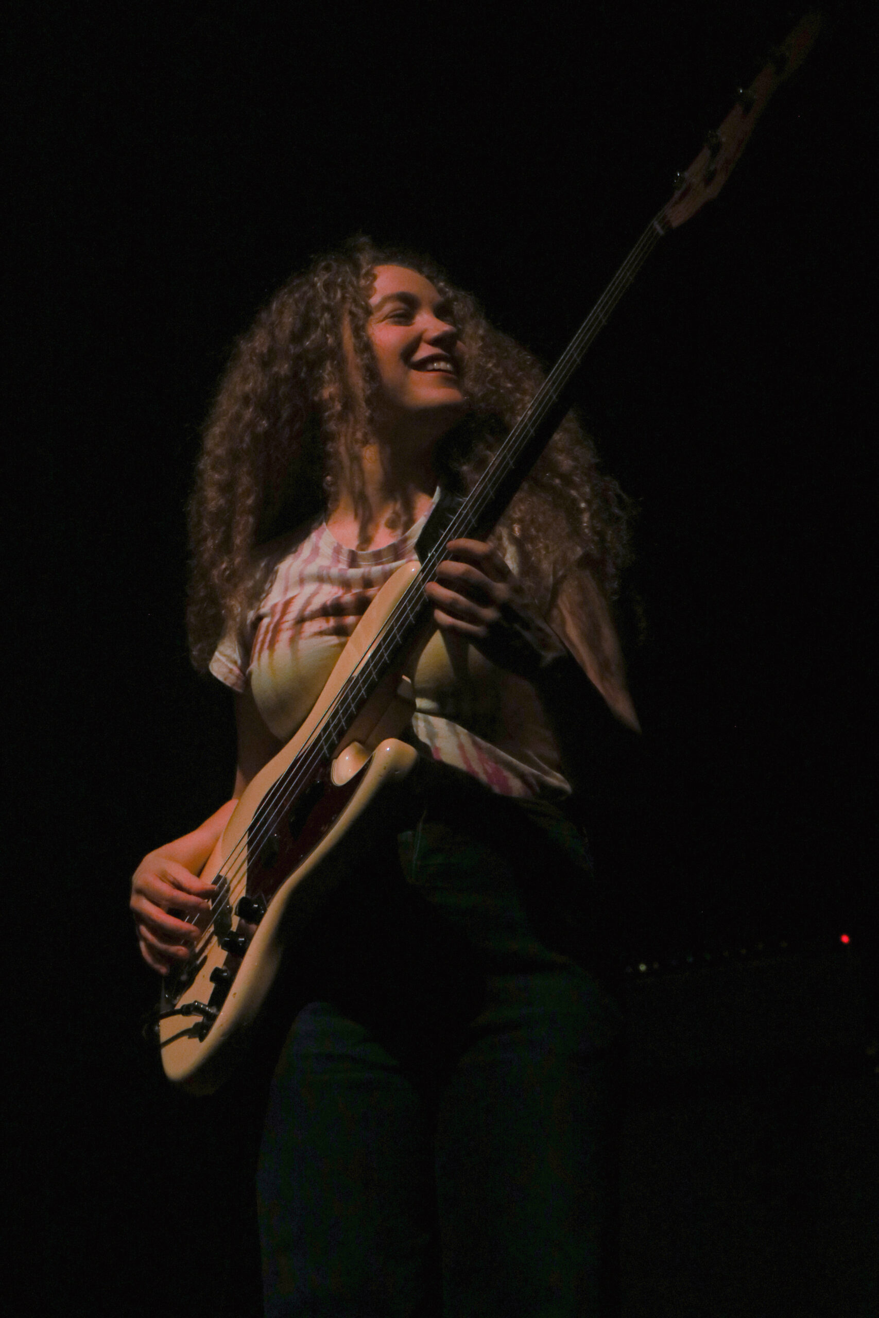 Incubus's bassist Tal Wilkenfeld playing to the crowd